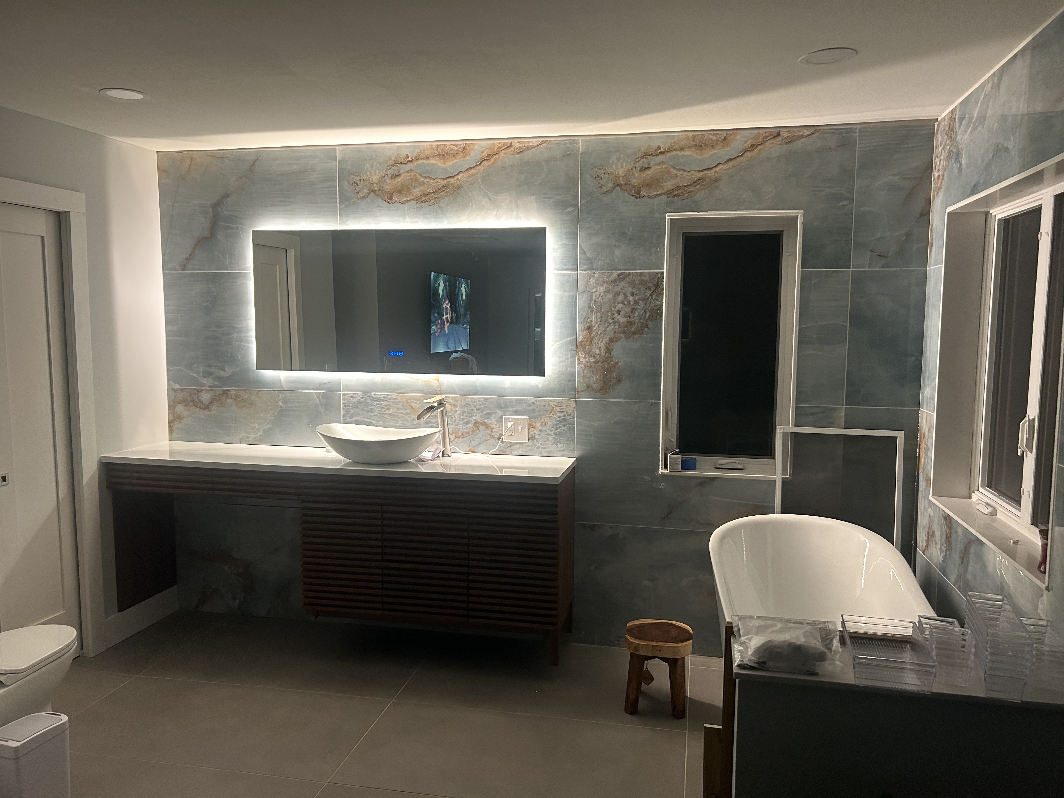 Luxury bathroom with marble tile installation
